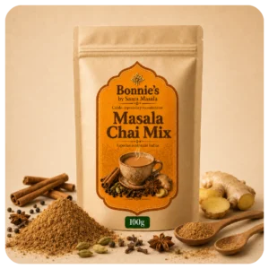 Masala Chai Mix Bonnie’s by Santa Masala de 100 g en bolsa beige con etiqueta naranja, mezcla de canela, cardamomo, jengibre y clavo.